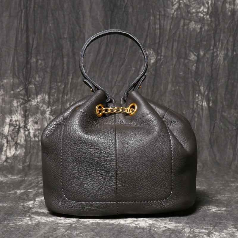 Bolsa Bucket em Couro Legítimo Corrente e Cordão