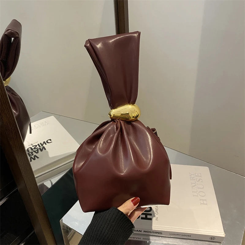 Bolsa AirBag Laço Dourado